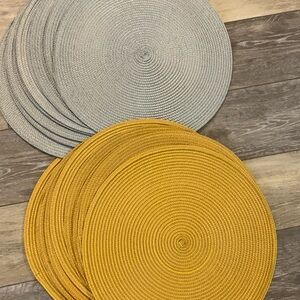 Set of Woven Placemats in mint green and golden yellow.